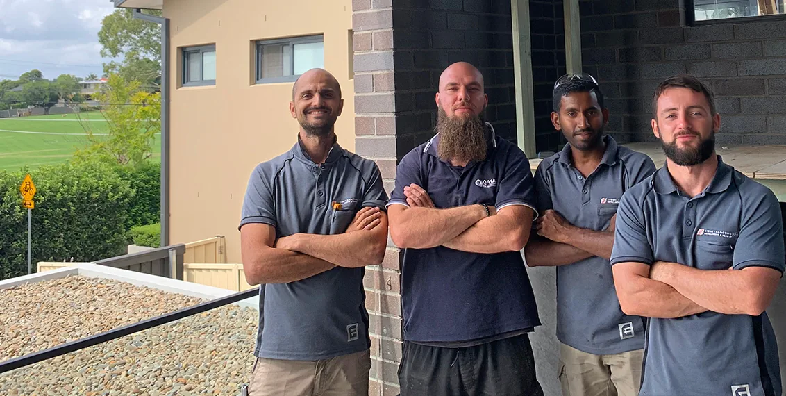Peter with his crew on a rangehood job site
