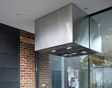 A large outdoor canopy rangehood designed for effective ventilation in an outdoor kitchen setting