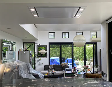 An elegant and modern ceiling cassette rangehood in a modern home, providing a sleek and efficient ventilation solution