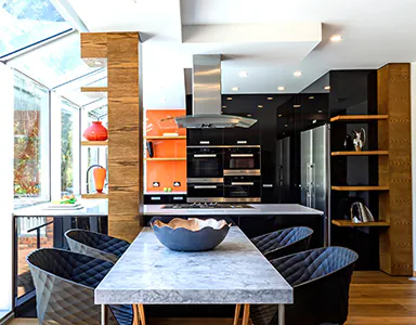 A small island rangehood in a modern kitchen, designed for effective ventilation in compact spaces