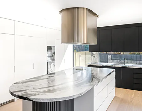 An example of a bronze finished island rangehood