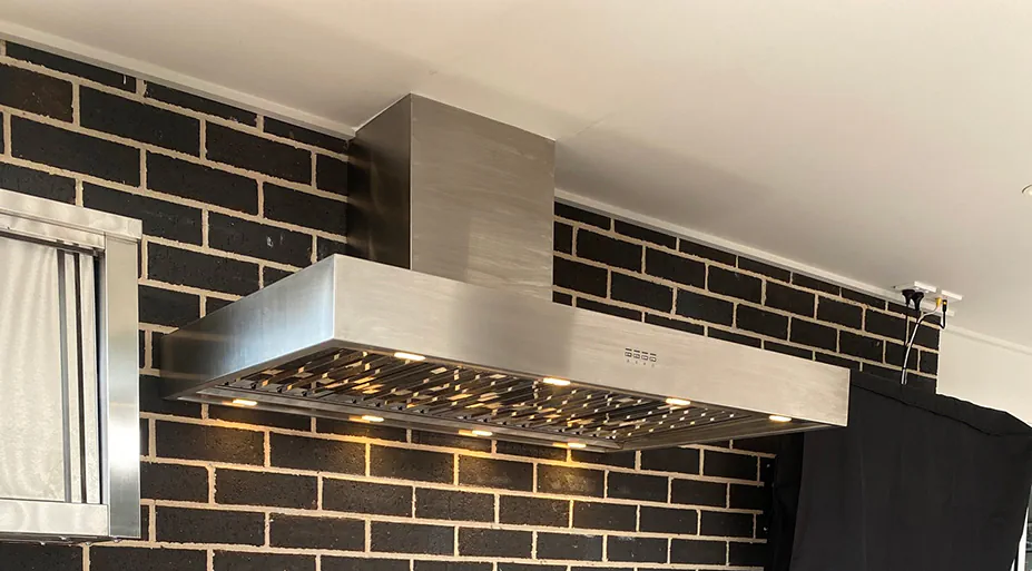 A freshly cleaned stainless steel rangehood