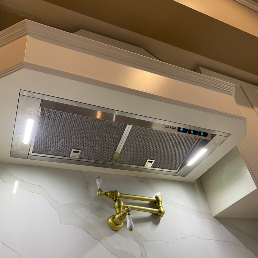 Full view of a Qasair Undermount Rangehood installed in a high-end kitchen renovation project in Dural, NSW