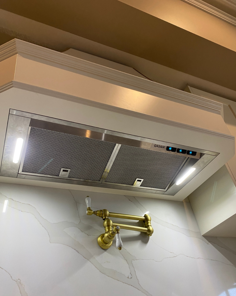 Full view of a Qasair Undermount Rangehood installed in a high-end kitchen renovation project in Dural, NSW